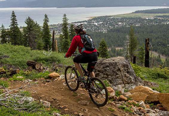 woman mountain biking
